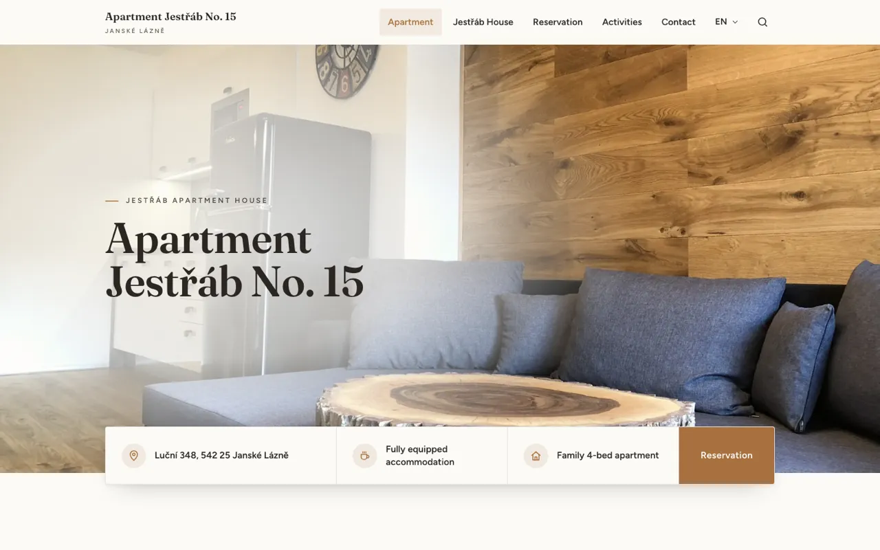The rebuilt homepage: warm oak palette, large photography, key facts on a card overlapping the hero.